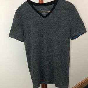 Gray v neck with black trim collar